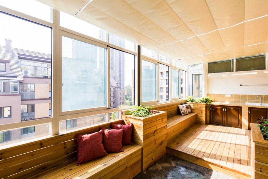 简约田园风格生态木阳台装修效果图 简约田园风格生态木阳台装修效果图